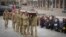Ukrainian servicemen carry the coffin of their comrade Oleh Yurchenko, killed in a battle with Russian forces in the Donetsk, region during a memorial ceremony in Independence Square in Kyiv, Jan. 8, 2023. 