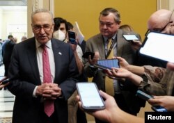 U.S. Senate Majority Leader Chuck Schumer speaks with members of the media prior to voting on a bill avoiding a nationwide railroad strike, on Capitol Hill in Washington, Dec. 1, 2022.