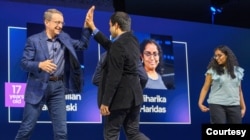 Previous AI for Global Impact winners are greeted by Intel CEO Pat Gelsinger at the Intel Vision event in May 2022 (Credit: Intel Corporation)