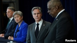 Australian Deputy Prime Minister and Defense Minister Richard Marles, Australian Foreign Minister Penny Wong, US Secretary of State Antony Blinken and US Secretary of Defense Lloyd Austin hold a news conference at the State Department in Washington, Dec. 6, 2022.