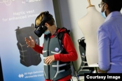 Employees of the Parisian technology company Actronika are working on the development of the Skinetic wearable vest, designed to copy the human sense of smell.  (Image credit: Skinetic)
