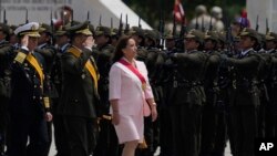 Peru's new President Dina Boluarte attends a ceremony marking Army Day in Lima, Peru, Dec. 9, 2022. 