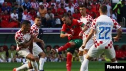 Moroccan winger Hakim Ziyech shoots at goal during a Group F match at the 2022 FIFA World Cup between Morocco and Croatia, Qatar, November 23, 2022.