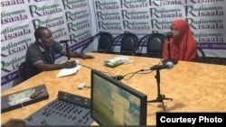 An interview takes place at Radio Risaala in Somalia's capital Mogadishu. (Risaala Media Corporation)