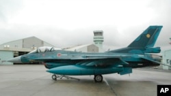 FILE - A F-2 fighter of Japan Air Self-Defense Force is seen at Tsuiki base, Fukuoka prefecture, southern Japan in March 2010. 