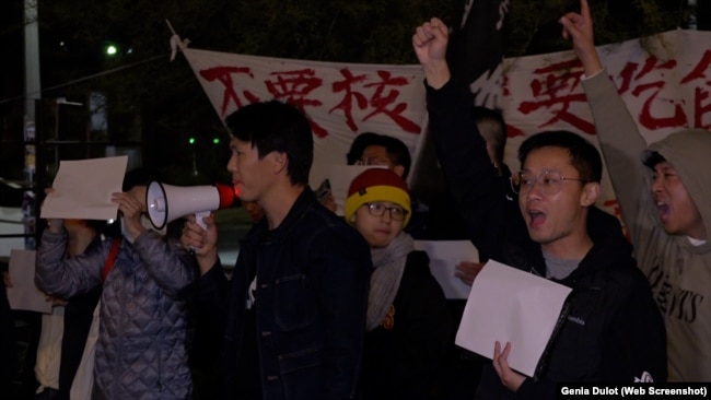 Overseas Chinese students and residents gathered in Los Angeles on Nov. 29, 2022, to remember victims of a Chinese apartment fire and protest China's zero-COVID policy. A blank sheet of paper symbolizes things the Chinese people want to say but cannot because of censorship.