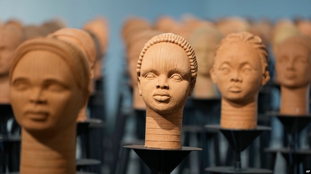 Sculptures created by French artist Prune Nourry representing the approximately100 Chibok schoolgirls still in captivity are displayed in Lagos, Nigeria, Dec. 13, 2022. 