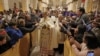 The Archbishop Pierbattista Pizzaballa, apostolic administrator of the Latin Patriarch of Jerusalem leads a Christmas midnight mass at Saint Catherine's Church, in the Church of the Nativity in Bethlehem, Dec. 25, 2022.