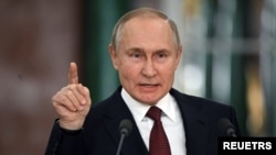 블라디미르 푸틴 러시아 대통령이 22일 기자회견에서 발언하고 있다.