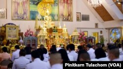 Officials pay their respects in front of a picture of Thailand’s Princess Bajrakitiyabha as she has been hospitalized due to a heart problem during the merit-making ceremony at Wat Thai Washington, DC, Silver Spring, MD. Dec 19, 2022.