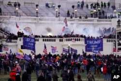 FILE - Supporters of former President Donald Trump stormed the U.S. Capitol, Jan. 6, 2021, in Washington, DC. (AP Photo/John Minchillo, File)