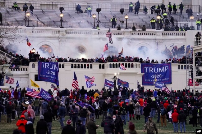 FILE - Supporters of former President Donald Trump stormed the U.S. Capitol, Jan. 6, 2021, in Washington, DC. (AP Photo/John Minchillo, File)