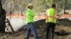 In this photo provided by Shawna Garcia, monitors working with the Wintu Tribe of Northern California search a construction site on Nov. 30, 2022, in Redding, California.