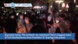 VOA60 World - China Strengthens Police Presence in Response to Protests