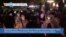 VOA60 World - China Strengthens Police Presence in Response to Protests