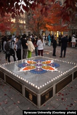 Members of the campus community gather together in the Orange Grove to Celebrate Diwali at Syracuse University. (Syracuse University)