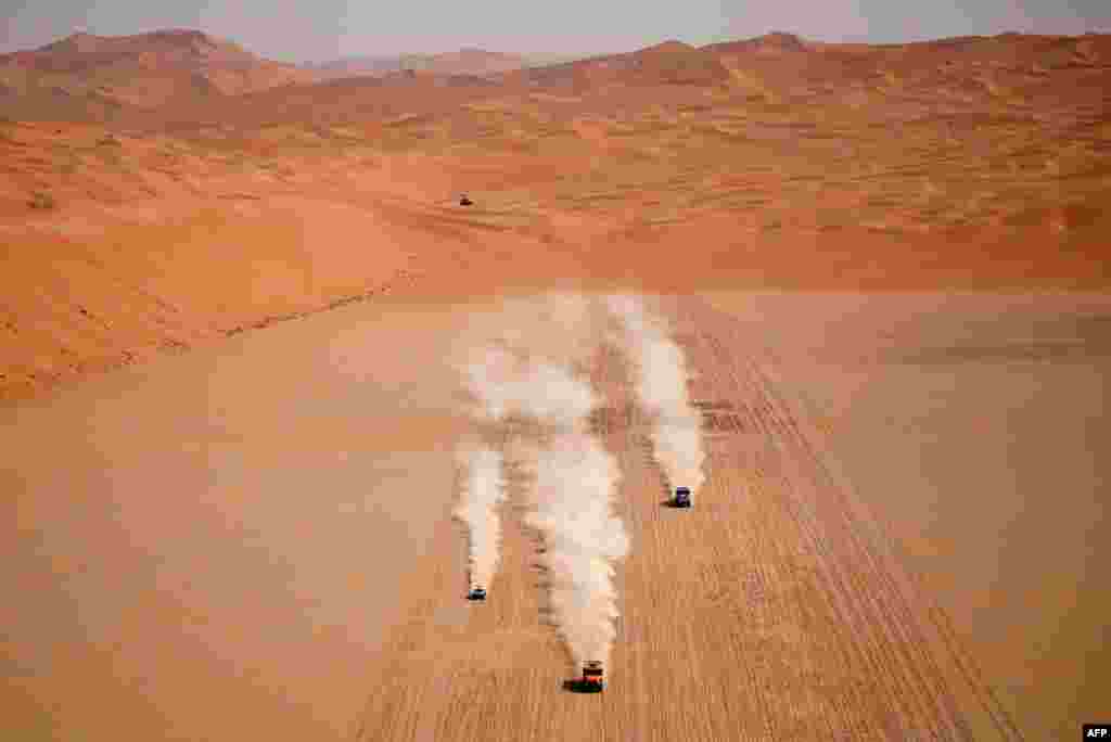 Drivers compete during Stage 12 of the Dakar 2023 between Empty Quarter Marathon and Shaybah, in Saudi Arabia.