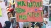 FILE - People take part in a march during the opening of COP15, the two-week U.N. Biodiversity summit in Montreal, Quebec, Canada, Dec. 10, 2022. 