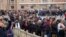 People line up to enter Saint Peter's Basilica at the Vatican where late Pope Benedict 16 is being laid in state at The Vatican, Jan. 2, 2023.