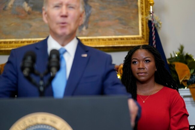 Cherelle Griner, wife of WNBA star Brittney Griner, listens as President Joe Biden announces Brittney Griner's release in a prisoner swap with Russia, in the Roosevelt Room of the White House in Washington, Dec. 8, 2022. (AP Photo/Patrick Semansky)