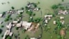 FILE - Rumah-rumah terendam banjir di kota Sohbat Pur, sebuah distrik di provinsi Baluchistan barat daya Pakistan, 30 Agustus 2022.(AP/Zahid Hussain, File)