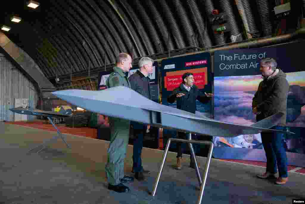 Prime Minister Rishi Sunak during his visit to RAF Coningsby in Linconshire following the announcement that Britain will work to develop next-generation fighter jets with Italy and Japan. The jets, called Tempest in the UK, are to take to the skies by 2035 and serve as a successor to the RAF Typhoon. The ambition is for the planes developed under the global combat air programme (GCAP) to be enhanced by capabilities including uncrewed aircraft, advanced sensors and cutting-edge weapons. December 9, 2022. Joe Giddens/Pool via&nbsp;