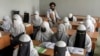 FILE - Afghan girls attend a religious school, which remained open since the last year's Taliban takeover, in Kabul, Afghanistan, Aug 11, 2022. (AP Photo/Ebrahim Noroozi, File)