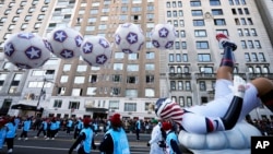 The U.S. Soccer float rides in the Macy's Thanksgiving Day Parade on Thursday, Nov. 24, 2022, in New York. (Photo by Charles Sykes/Invision/AP)