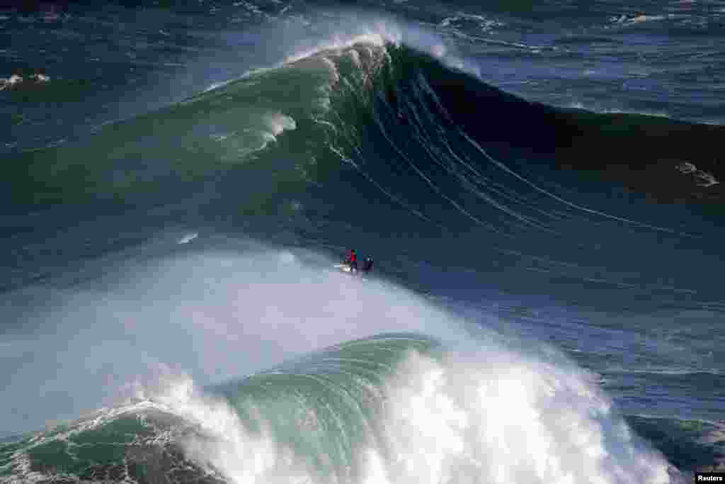 A jet ski is seen in Praia do Norte, Nazare, Portugal.