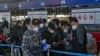 日本宣布不再要求所有来自中国的旅客接受新冠病毒落地检