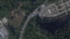 2022年12月26日，卫星图片显示广州市番禺区殡仪馆外车辆集结（来源：Planet Labs PBC)