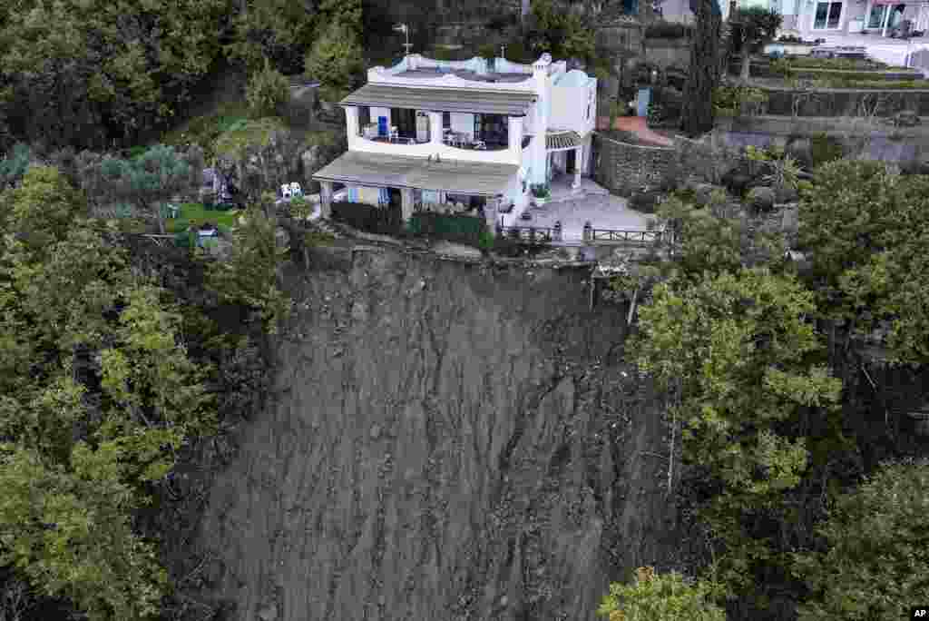 A house is left standing on the edge of a landslide in Casamicciola on the southern Italian island of Ischia, Italy.