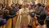 The acting Latin Patriarch of Jerusalem Pierbattista Pizzaballa leads a Christmas midnight Mass at the Church of the Nativity compound in the West Bank town of Bethlehem, Dec. 25, 2022.