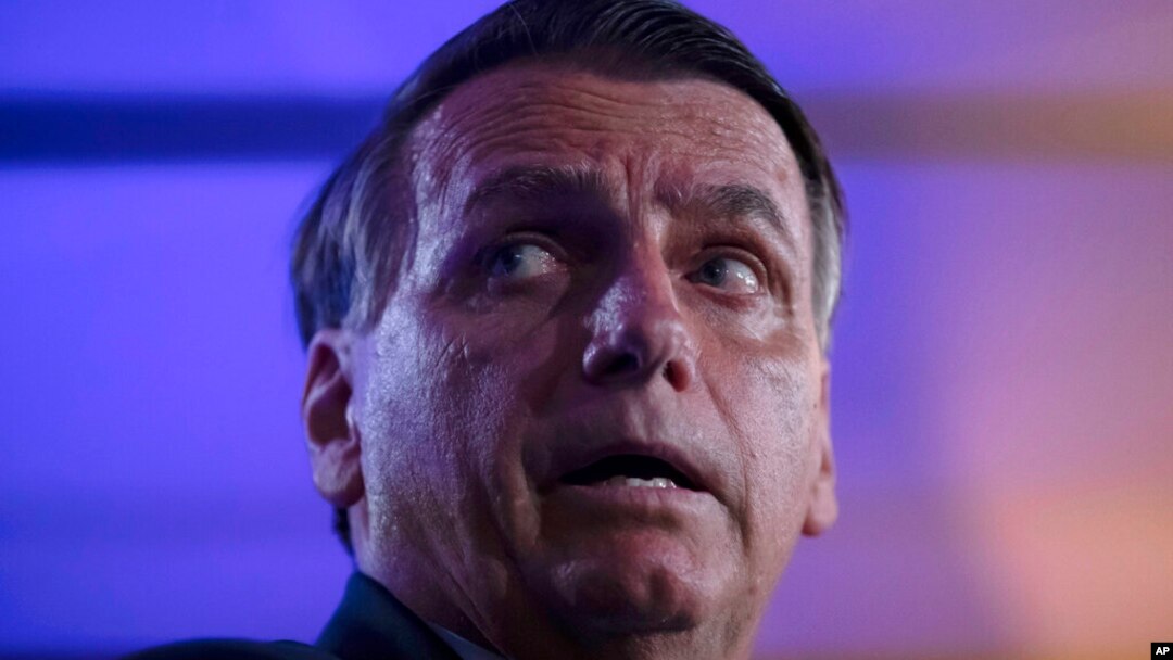 FILE - Jair Bolsonaro attends a press conference in Rio de Janeiro, Brazil, Oct. 29, 2022. After losing reelection to serve another term as Brazil's president, he flew to the United States in December 2022.