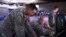 FILE A US Army captain explains predictions of space interference to a fellow Army officer March 10, 2015, in the Republic of Korea Air and Space Operation Center during exercise Key Resolve at Osan Air Base.