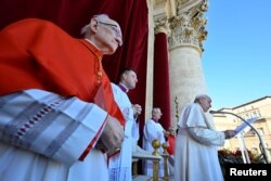 Pope Francis delivers his traditional Christmas Day Urbi et Orbi message to the city and the world from the main balcony of St. Peter's Basilica at the Vatican, Dec. 25, 2022. (Vatican Media/­Handout via Reuters)