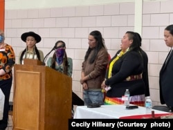 Members of the International Indigenous Youth Council's Oglala Lakota Chapter offer a prayers during the repatriation of artifacts associated with the 1890 Wounded Knee, Sat., Nov. 5, 2022, in Barre, Massachusetts.