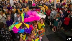 The Baby Dolls make an entrance during the King's Day celebration while kicking-off the official start of 2023 Carnival Season in New Orleans, Jan. 6, 2023.