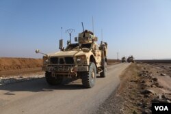 Patroli bersama Pasukan Demokratik Suriah (SDF) dan pasukan koalisi internasional, 3 Desember 2022.
