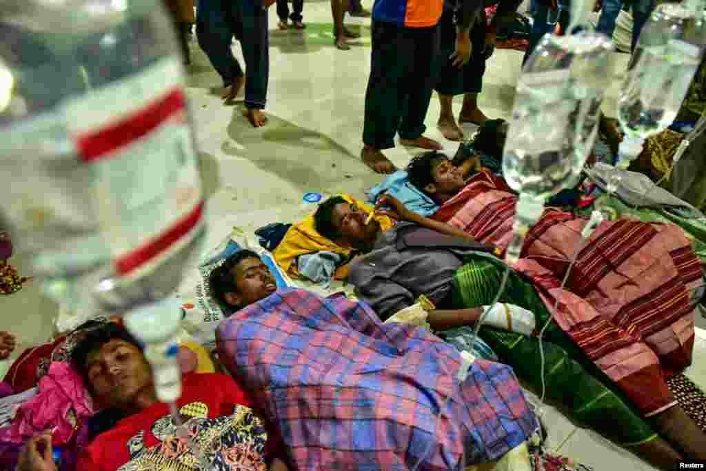 Rohingya refugees receive medical treatment after their arrival at the temporary shelter in Pidie, Aceh province, Indonesia, Dec. 26, 2022.