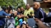 Members of the African National Congress address the media after the ANC National Executive Committee meeting in Johannesburg, South Africa, Dec. 2, 2022. 