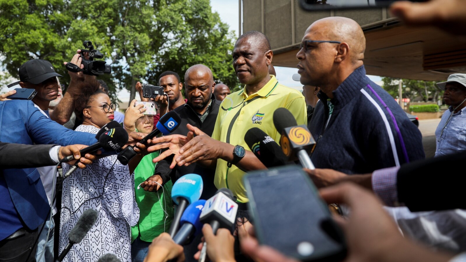Members of the African National Congress address the media after the ANC National Executive Committee meeting in Johannesburg, South Africa, Dec. 2, 2022. 
