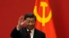 中國領導人習近平與中共黨旗