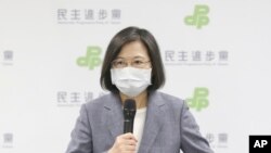 Taiwan President Tsai Ing-wen announces her resignation as party chairwoman of Democratic Progressive Party in Taipei, Taiwan, Saturday, Nov. 26, 2022. 