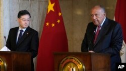 Chinese Foreign Minister Qin Gang listens during a press conference with his Egyptian counterpart Sameh Shoukry, at the Foreign Ministry headquarters in Cairo, Jan. 15, 2023. 