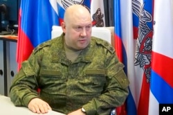 FILE - Gen. Sergei Surovikin speaks during an interview in this handout photo taken from video released by Russian Defense Ministry Press Service, Oct. 18, 2022.