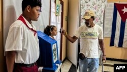 A man casts his vote at a polling station during the first round of municipal elections for councilors in Havana, Cuba, Nov. 27, 2022.