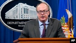 FILE - Jeffrey Clark, then an assistant attorney general, speaks during a news conference at the Justice Department in Washington, Sept. 14, 2020. 