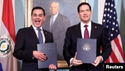 美国国务卿马尔科·卢比奥与巴拉圭副总统佩德罗·阿利亚纳在美国国务院出席战略性民用核能合作谅解备忘录签署仪式。(2026年8月4日)