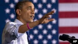 President Barack Obama speaks at a campaign event at Cornell College, in Mt. Vernon, Iowa, October 17, 2012.